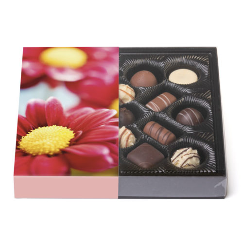 200g feinste Trüffel in einer Klarsichtpackung mit blumigen Banderole